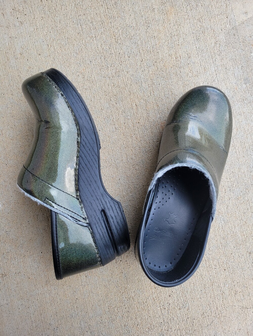 Dansko iridescent green nursing doctor clogs